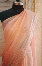 Coral Mirage – Coral Pink Shimmer Georgette Saree