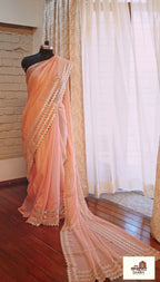 Coral Mirage – Coral Pink Shimmer Georgette Saree