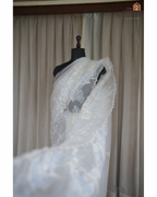 Winter Bloom – Serene White Glass Tissue Saree