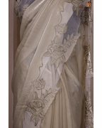 Ethereal Blooms – Soft Sage Cream Shimmer Tissue Saree