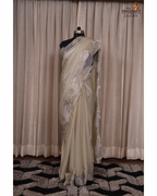Ethereal Blooms – Soft Sage Cream Shimmer Tissue Saree