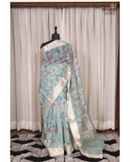 Luminous Hues – Soft Teal Cream Organza Saree