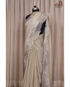 Ethereal Blooms – Soft Sage Cream Shimmer Tissue Saree