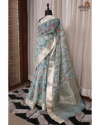Luminous Hues – Soft Teal Cream Organza Saree